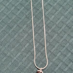 Elegant Silver Necklace with Brown Pendant